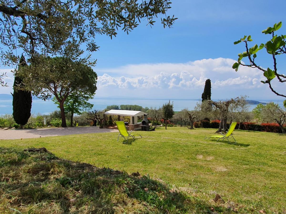 Antico Casale Tiravento Aparthotel Passignano sul Trasimeno Bagian luar foto