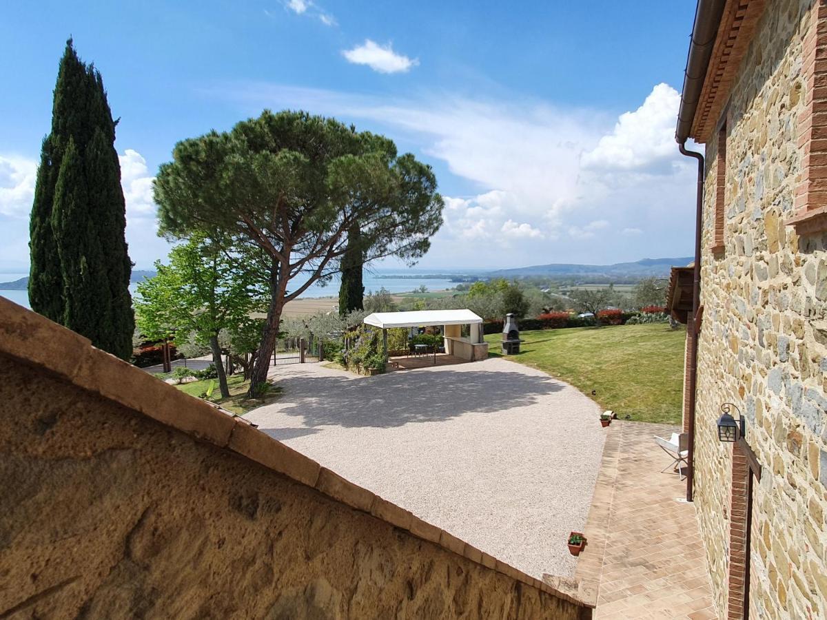 Antico Casale Tiravento Aparthotel Passignano sul Trasimeno Bagian luar foto
