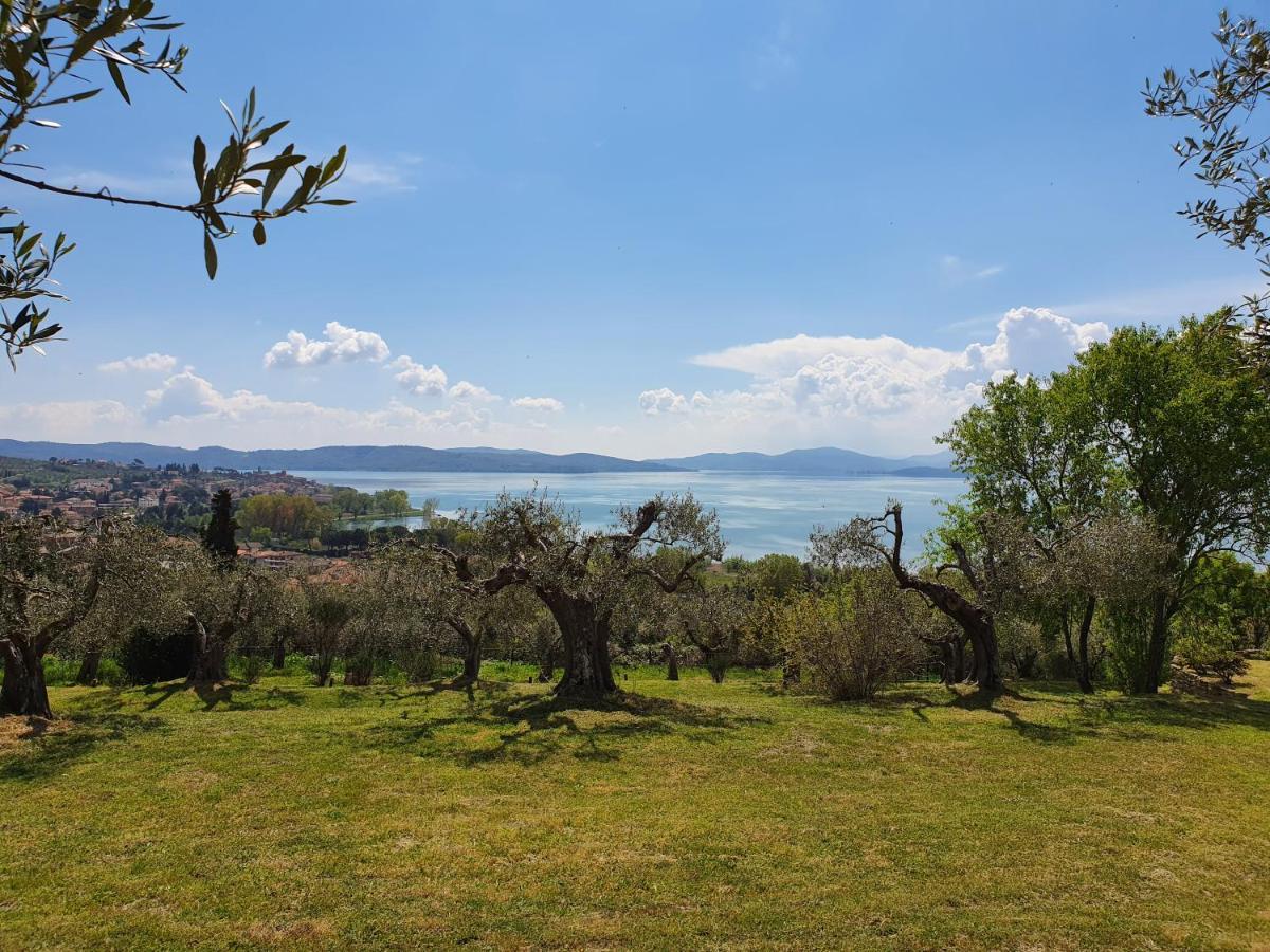 Antico Casale Tiravento Aparthotel Passignano sul Trasimeno Bagian luar foto