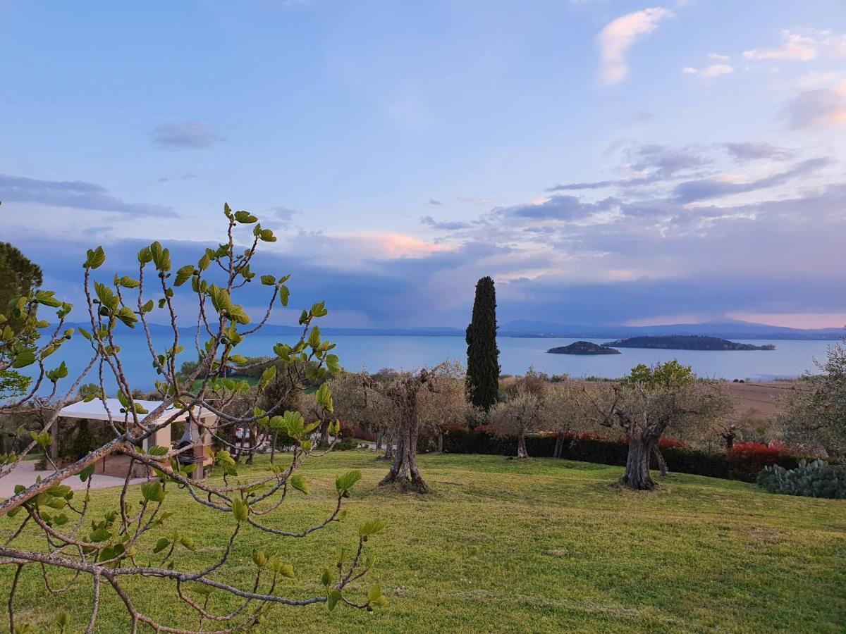 Antico Casale Tiravento Aparthotel Passignano sul Trasimeno Bagian luar foto