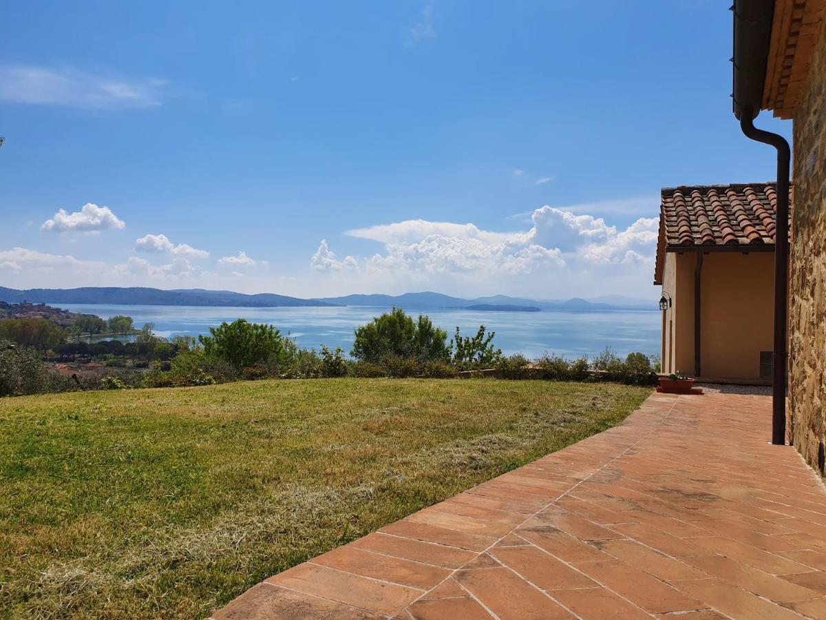 Antico Casale Tiravento Aparthotel Passignano sul Trasimeno Bagian luar foto
