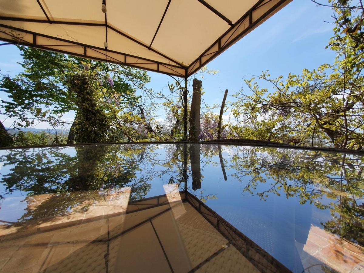 Antico Casale Tiravento Aparthotel Passignano sul Trasimeno Bagian luar foto