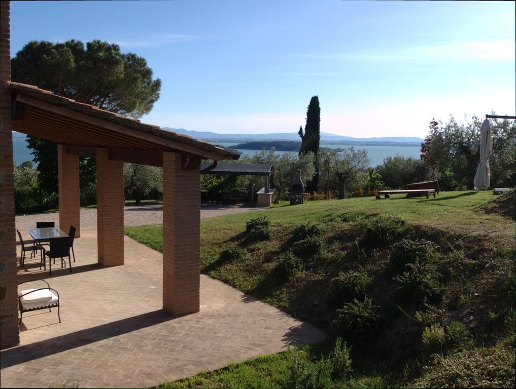 Antico Casale Tiravento Aparthotel Passignano sul Trasimeno Bagian luar foto