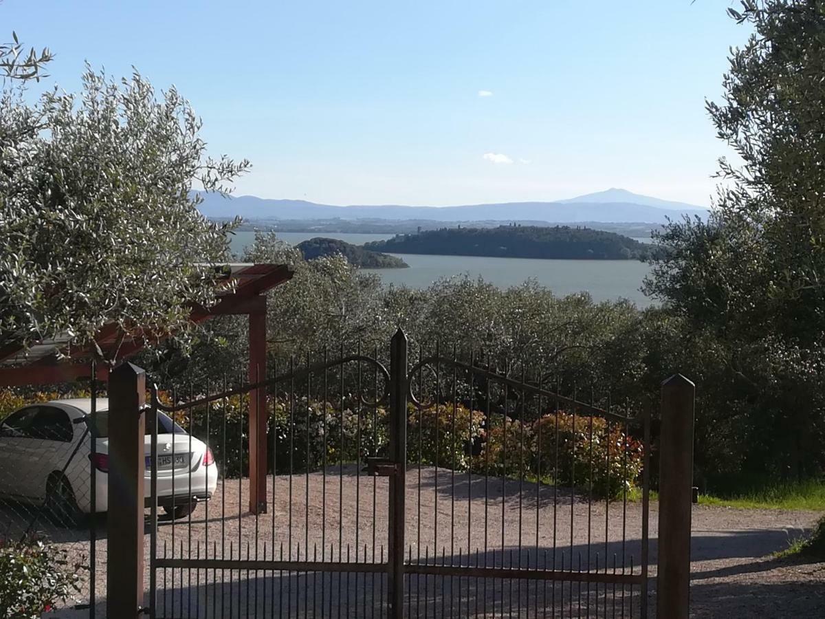 Antico Casale Tiravento Aparthotel Passignano sul Trasimeno Bagian luar foto